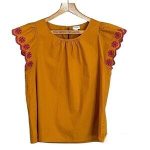 J. Crew eyelet embroidered flutter sleeved top. Women’s size medium.
